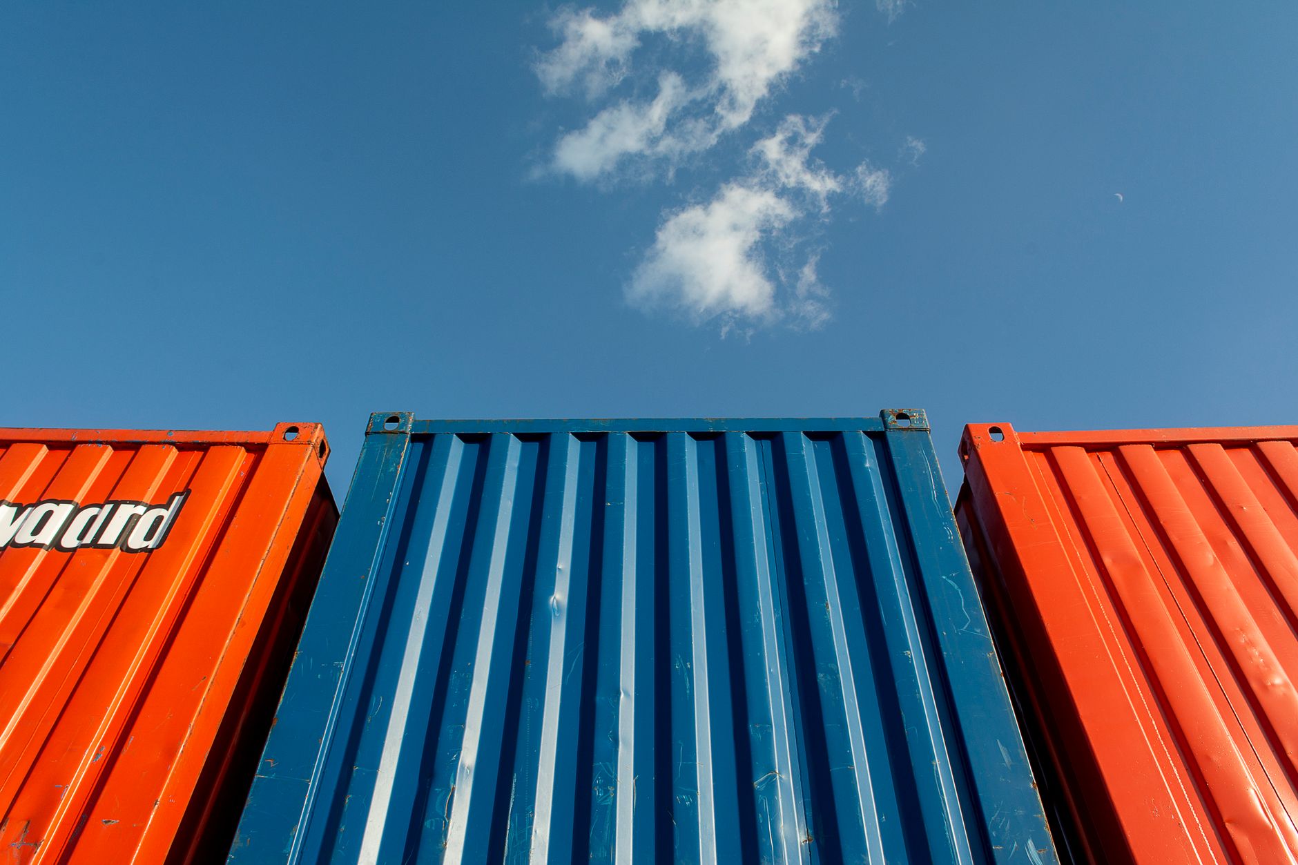 Commercial battery storage installation — containerised BESS and switchgear on a UK site